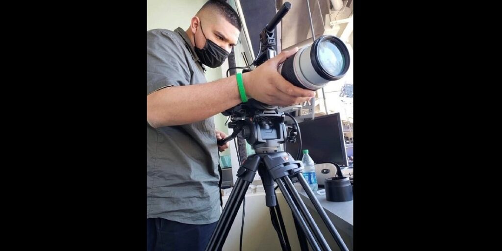 Film Connection graduate John Lacuesta on camera for EQ Studios in San Diego where he was hired as Studio Manager/1st AC aka 1st Assistant Camera