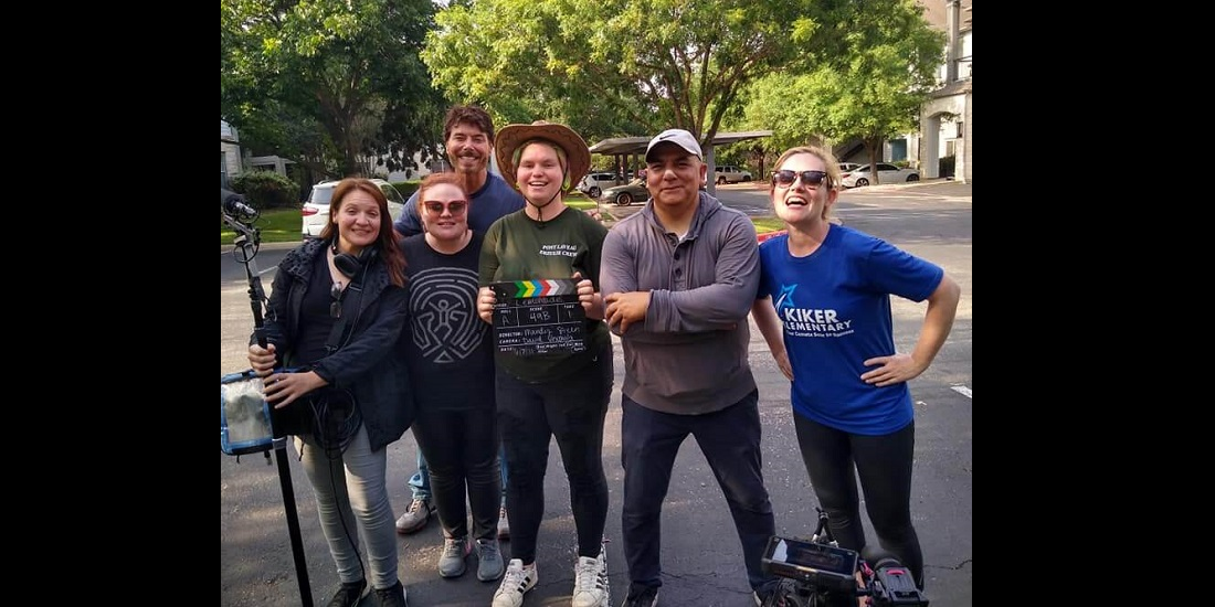 Working as 1st AD (Assistant Director) is Film Connection graduate Shaylah Conley (in green) and the crew of short film “Sweet Lemonade”