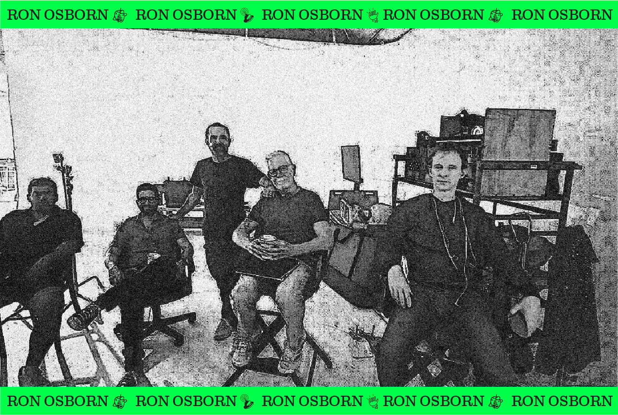 Black and white picture of Ron Osborn and film crew on set.