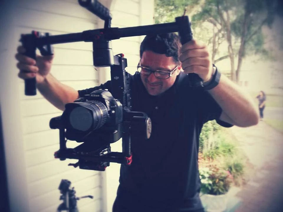 Rob Chiola Film Connection student working on set with camera