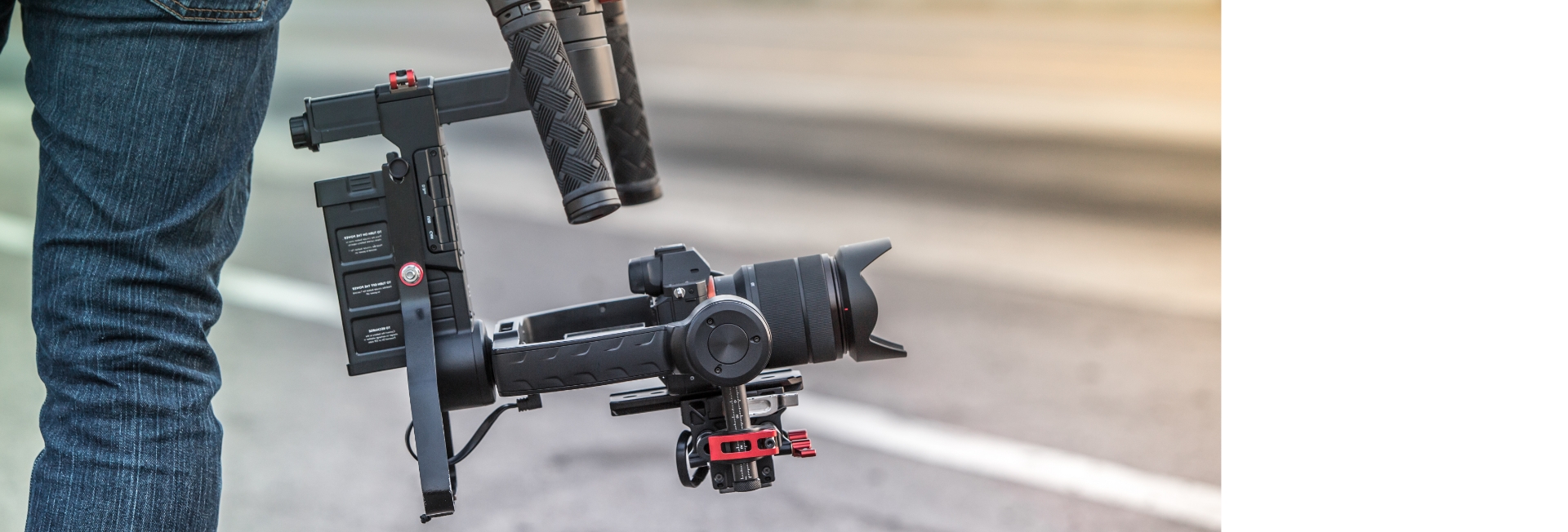 Photo of a camera operator controlling a remote camera